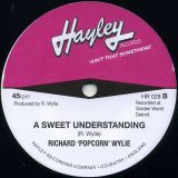 Popcorn Wylie And The United Sound Singers – Goin’ To A Happening b/w Richard ‘Popcorn’ Wylie – A Sweet Understanding – Hayley UK 7″