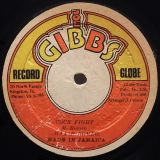 Max Romeo – Cock Fight b/w The Professionals – Puss Fight – Joe Gibbs Record Globe JAM 12″