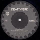 Kraftwerk – Tour De France (French Version) b/w Tour De France (Remix) – Warner Bros. 12″